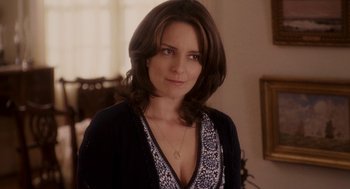 Movie still from “Baby Mama” (2008), directed by Michael McCullers – A person wearing a necklace; Close Up shot, Over the shoulder angle