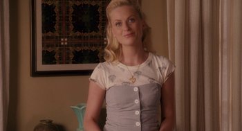 Movie still from “Baby Mama” (2008), directed by Michael McCullers – A woman standing in front of a window; Medium shot, Over the shoulder angle