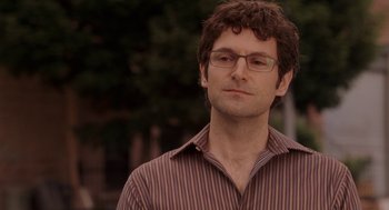 Movie still from “Baby Mama” (2008), directed by Michael McCullers – A person wearing glasses; Close Up shot, Over the shoulder angle