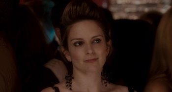 Movie still from “Baby Mama” (2008), directed by Michael McCullers – A person wearing a dress; Close Up shot, Over the shoulder angle