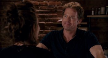 Movie still from “Baby Mama” (2008), directed by Michael McCullers – A man and a woman sitting in front of a brick wall; Close Up shot, Over the shoulder angle