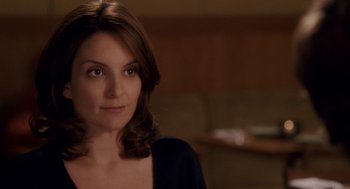 Movie still from “Baby Mama” (2008), directed by Michael McCullers – A person wearing a blue shirt; Close Up shot, Over the shoulder angle