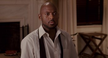 Movie still from “Baby Mama” (2008), directed by Michael McCullers – A man in a white dress shirt and black tie; Close Up shot, Over the shoulder angle