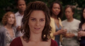 Movie still from “Baby Mama” (2008), directed by Michael McCullers – A person wearing a red shirt; Close Up shot, Over the shoulder angle