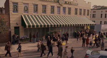 Movie still from “Baby Mama” (2008), directed by Michael McCullers – A group of people walking down a street; Extreme Wide shot, High angle