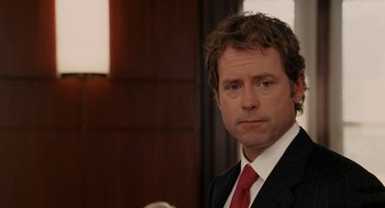 Movie still from “Baby Mama” (2008), directed by Michael McCullers – A man in a suit and red tie; Close Up shot, Over the shoulder angle