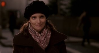 Movie still from “Baby Mama” (2008), directed by Michael McCullers – A woman wearing a black hat and a scarf; Close Up shot, Over the shoulder angle
