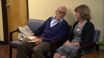 Movie still from “Jackass Presents: Bad Grandpa” (2013), directed by Jeff Tremaine – An older man sitting next to an older woman; Medium shot, Over the shoulder angle