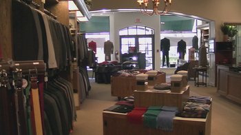 Movie still from “Jackass Presents: Bad Grandpa” (2013), directed by Jeff Tremaine – A clothing store filled with lots of clothes and accessories; Wide shot, Low angle