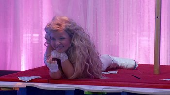 Movie still from “Jackass Presents: Bad Grandpa” (2013), directed by Jeff Tremaine – A woman laying on the ground in a white dress; Medium shot, High angle