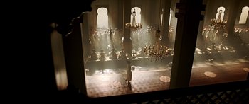 Movie still from “Bajirao Mastani” (2015), directed by Sanjay Leela Bhansali – A group of people standing in a large room with chandeliers; Extreme Wide shot, High angle