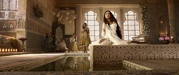 Movie still from “Bajirao Mastani” (2015), directed by Sanjay Leela Bhansali – A group of women sitting on top of a wooden platform; Wide shot, Low angle