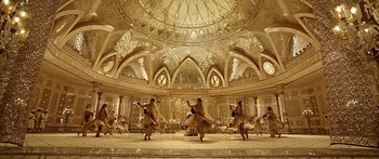 Movie still from “Bajirao Mastani” (2015), directed by Sanjay Leela Bhansali – A group of people dancing inside of a building; Extreme Wide shot, Low angle