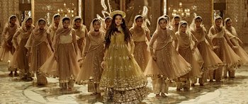 Movie still from “Bajirao Mastani” (2015), directed by Sanjay Leela Bhansali – A group of women in fancy dresses in a room; Wide shot, Low angle