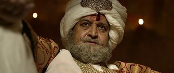 Movie still from “Bajirao Mastani” (2015), directed by Sanjay Leela Bhansali – A man with a beard wearing a turban; Close Up shot, Low angle