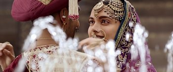 Movie still from “Bajirao Mastani” (2015), directed by Sanjay Leela Bhansali – A man and a woman in traditional indian clothing; Extreme Close Up shot, Over the shoulder angle