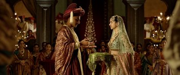 Movie still from “Bajirao Mastani” (2015), directed by Sanjay Leela Bhansali – A man and a woman dressed in traditional indian garb; Medium shot, Over the shoulder angle
