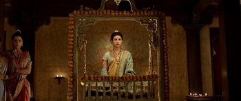 Movie still from “Bajirao Mastani” (2015), directed by Sanjay Leela Bhansali – A painting of a woman in traditional indian garb; Medium shot, Low angle