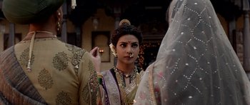 Movie still from “Bajirao Mastani” (2015), directed by Sanjay Leela Bhansali – A young woman in indian garb looking into the camera; Close Up shot, Over the shoulder angle