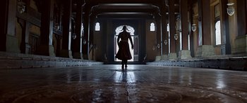 Movie still from “Bajirao Mastani” (2015), directed by Sanjay Leela Bhansali – A man is walking through an archway in a building; Wide shot, Low angle