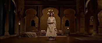 Movie still from “Bajirao Mastani” (2015), directed by Sanjay Leela Bhansali – A woman standing in front of a wall in a room; Wide shot, Low angle