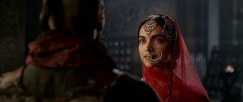 Movie still from “Bajirao Mastani” (2015), directed by Sanjay Leela Bhansali – A woman with a nose ring and a nose ring; Close Up shot, Over the shoulder angle