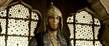 Movie still from “Bajirao Mastani” (2015), directed by Sanjay Leela Bhansali – A man with a beard wearing a gold helmet; Close Up shot, Low angle