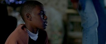 Movie still from “Ballast” (2008), directed by Lance Hammer – A person with a mouth open; Close Up shot, Over the shoulder angle