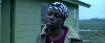 Movie still from “Ballast” (2008), directed by Lance Hammer – A person wearing a headscarf; Close Up shot, High angle