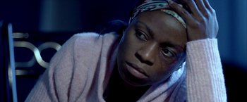 Movie still from “Ballast” (2008), directed by Lance Hammer – A person wearing a towel; Close Up shot, High angle