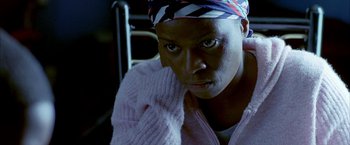 Movie still from “Ballast” (2008), directed by Lance Hammer – A person wearing a towel; Close Up shot, Low angle