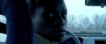 Movie still from “Ballast” (2008), directed by Lance Hammer – A woman sitting in the driver's seat of a car; Close Up shot, Over the shoulder angle