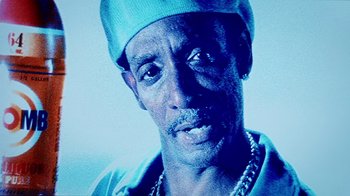 Movie still from “Bamboozled” (2000), directed by Spike Lee – A person wearing a hat; Extreme Close Up shot, Low angle