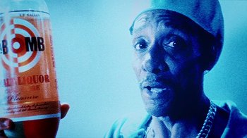 Movie still from “Bamboozled” (2000), directed by Spike Lee – A person with a hat on; Close Up shot, Low angle
