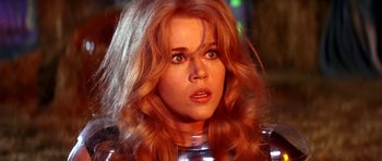 Movie still from “Barbarella” (1968), directed by Roger Vadim – A person with long hair; Close Up shot, Low angle