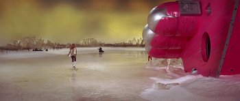 Movie still from “Barbarella” (1968), directed by Roger Vadim – A woman standing in the middle of an ocean with a bunch of balloons; Extreme Wide shot, High angle