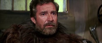 Movie still from “Barbarella” (1968), directed by Roger Vadim – A person wearing a fur coat; Close Up shot, Over the shoulder angle