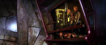 Movie still from “Barbarella” (1968), directed by Roger Vadim – A group of people standing on top of a staircase; Wide shot, Overhead angle