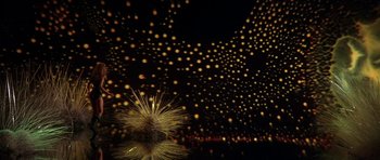 Movie still from “Barbarella” (1968), directed by Roger Vadim – A bunch of lights that are in the dark; Extreme Wide shot, High angle