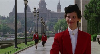 Movie still from “Barcelona” (1994), directed by Whit Stillman – A group of women walking down a sidewalk; Medium shot, Low angle