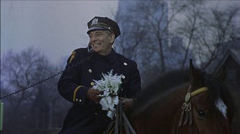Movie still from “Barefoot in the Park” (1967), directed by Gene Saks – An old man in a uniform is riding a horse; Medium shot, Low angle