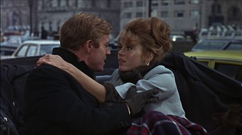 Movie still from “Barefoot in the Park” (1967), directed by Gene Saks – A man and a woman are hugging in the street; Close Up shot, Over the shoulder angle
