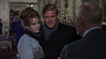 Movie still from “Barefoot in the Park” (1967), directed by Gene Saks – A man and a woman standing next to each other; Medium shot, Over the shoulder angle