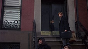 Movie still from “Barefoot in the Park” (1967), directed by Gene Saks – A man is walking down the steps of a building; Wide shot, Low angle