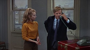 Movie still from “Barefoot in the Park” (1967), directed by Gene Saks – A man and a woman standing next to each other; Medium shot, Low angle
