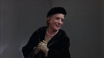 Movie still from “Barefoot in the Park” (1967), directed by Gene Saks – An older woman wearing a hat and gloves; Close Up shot, Low angle