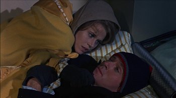 Movie still from “Barefoot in the Park” (1967), directed by Gene Saks – A man and a woman laying in a bed together; Close Up shot, High angle