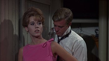 Movie still from “Barefoot in the Park” (1967), directed by Gene Saks – A man and a woman are standing together; Close Up shot, Over the shoulder angle