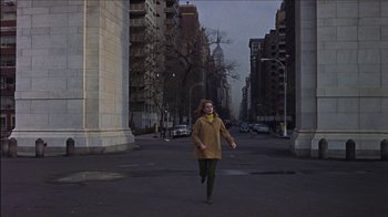 Movie still from “Barefoot in the Park” (1967), directed by Gene Saks – A woman walking down a street near tall buildings; Wide shot, High angle