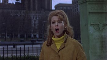 Movie still from “Barefoot in the Park” (1967), directed by Gene Saks – A young woman in a yellow jacket is looking surprised; Medium shot, Low angle